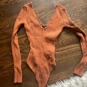 Double v neck ribbed rust orange bodysuit